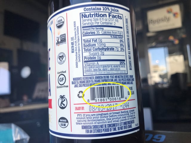 A bottle of Health-Ade kombucha features a unique bar code. 
