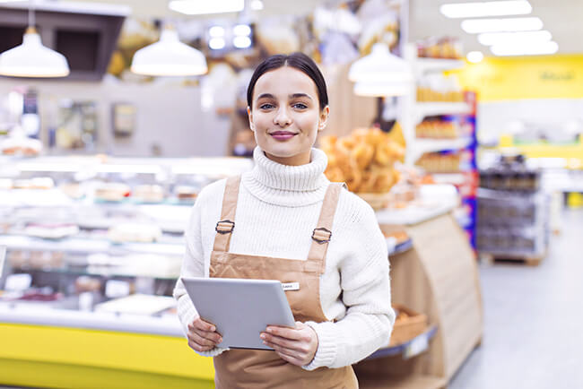 woman in store with tablet
